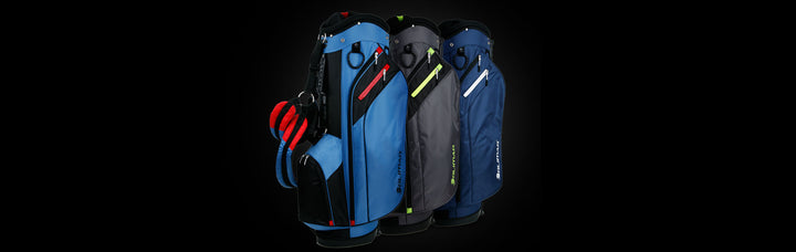 angled side and front views of 3 Orlimar SRX 7.4 Golf Stand Bags, blue/red (left), charcoal/lime (center), navy (right)
