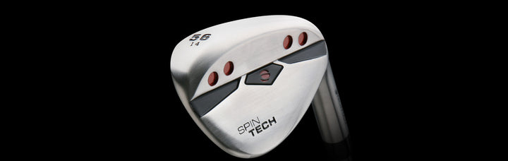 back view of an Orlimar Spin Tech sand wedge with 56 and 14 engraved on the sole to indicate the loft and bounce angle