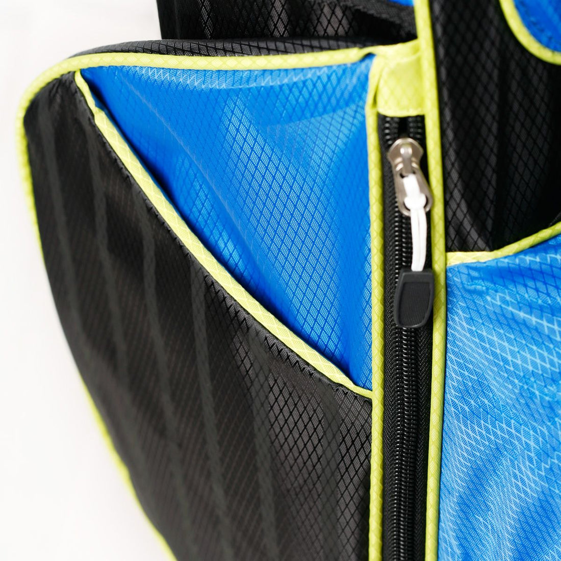 side pocket on a black, blue and lime green Orlimar ATS Junior Golf Bag