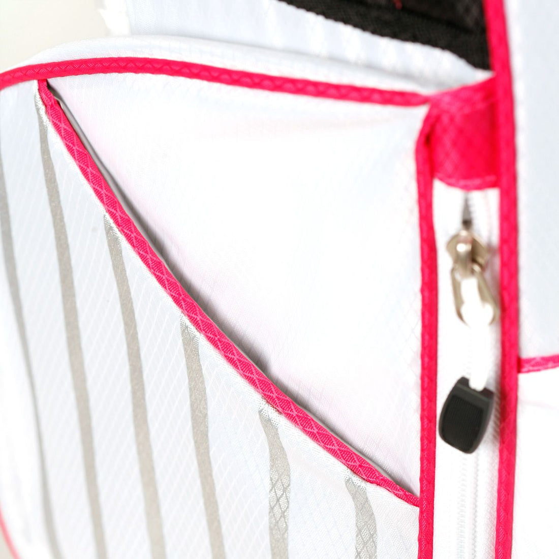 side pocket on a white/pink Orlimar ATS Junior Golf Bag