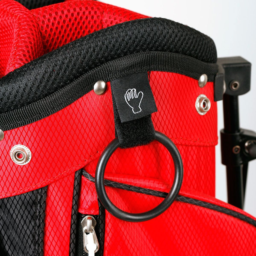 Velcro glove holder and towel ring on a red/black Orlimar ATS Junior Golf Bag