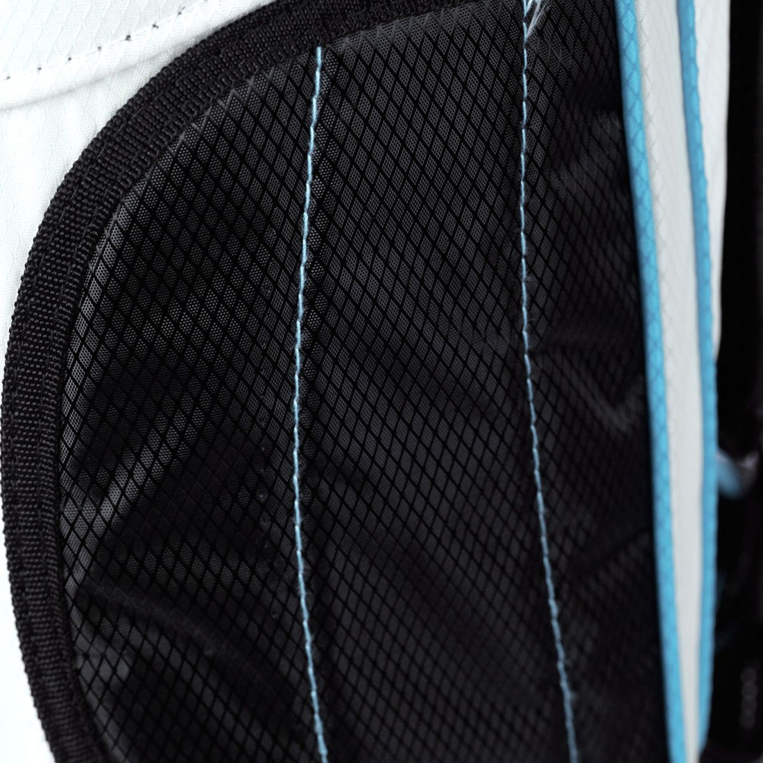 fabric detail on a white/sky blue Orlimar ATS Junior Golf Bag
