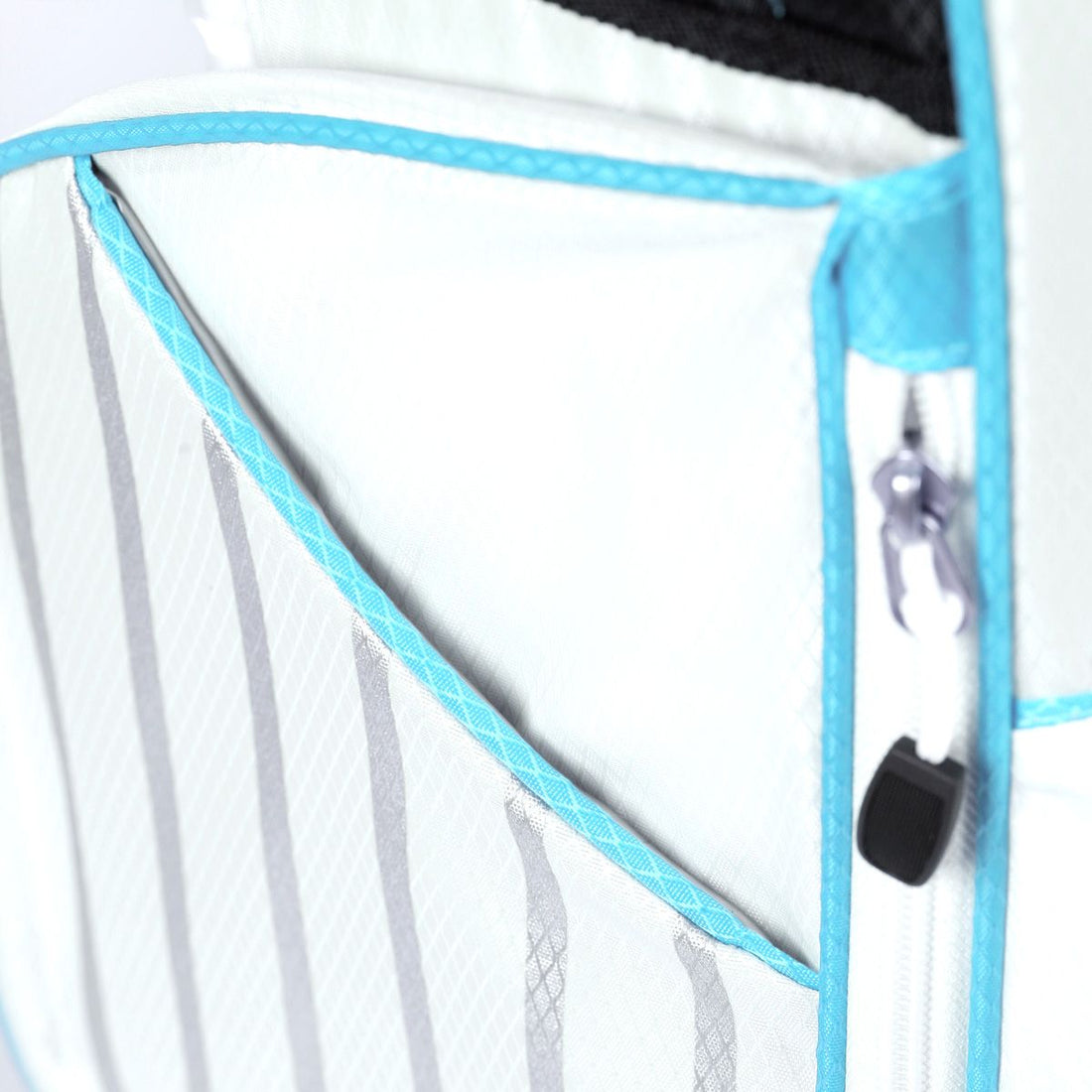 side pocket on a white/sky blue Orlimar ATS Junior Golf Bag