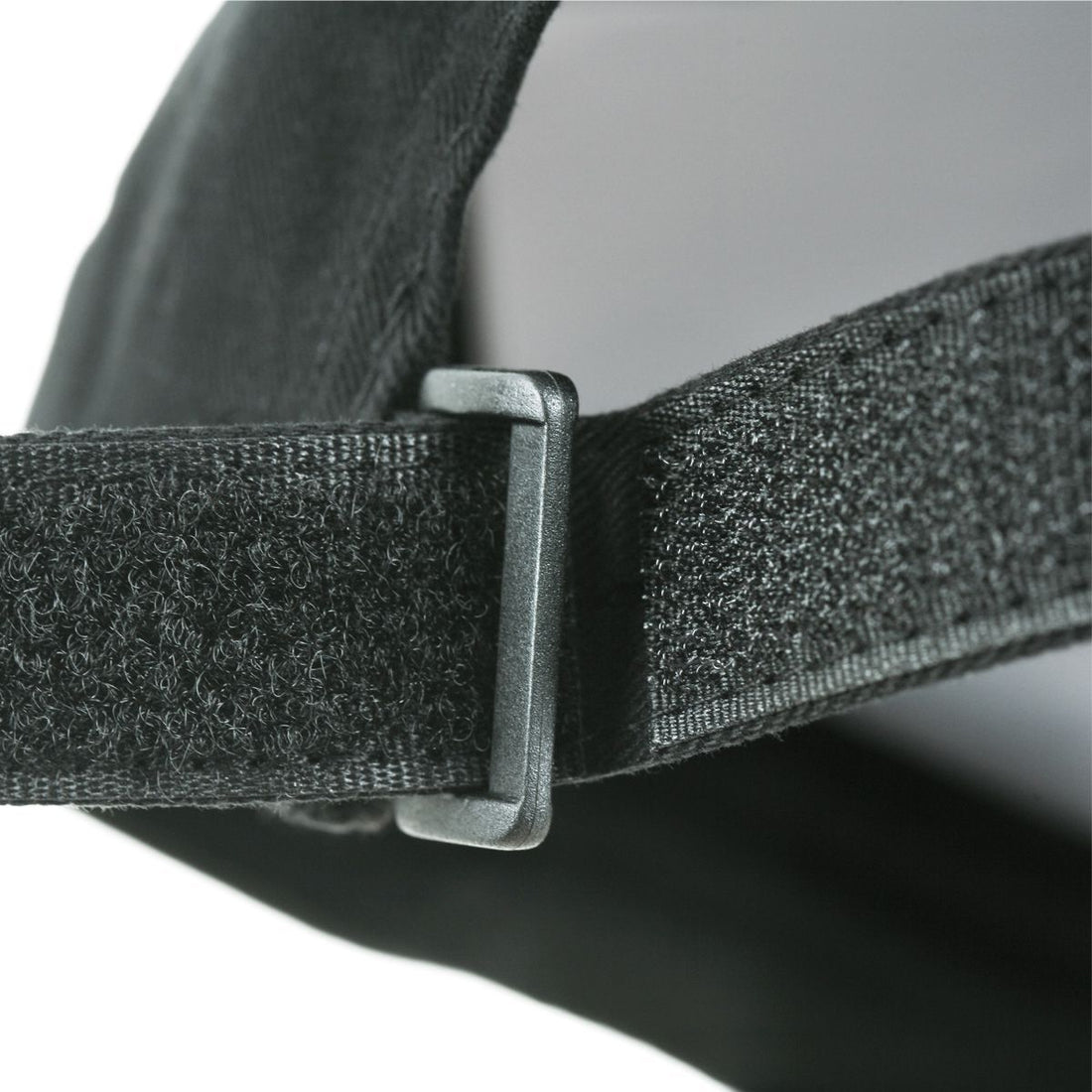 adjustable strap on the back of an Orlimar Golf Black Adjustable Hat