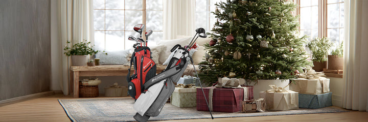 Pitch N Putt and ATS Junior Red/Black series in front of a Christmas tree.