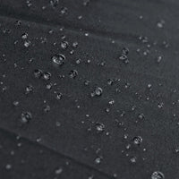 water beading on the top of a black Orlimar Dri-Clubz Golf Bag Umbrella