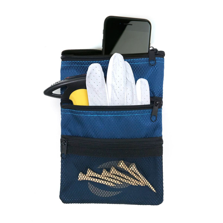 front view of a denim blue Orlimar Golf Detachable Accessory Pouch with cell phone, white glove and 6 natural golf tees inside the mesh pocket