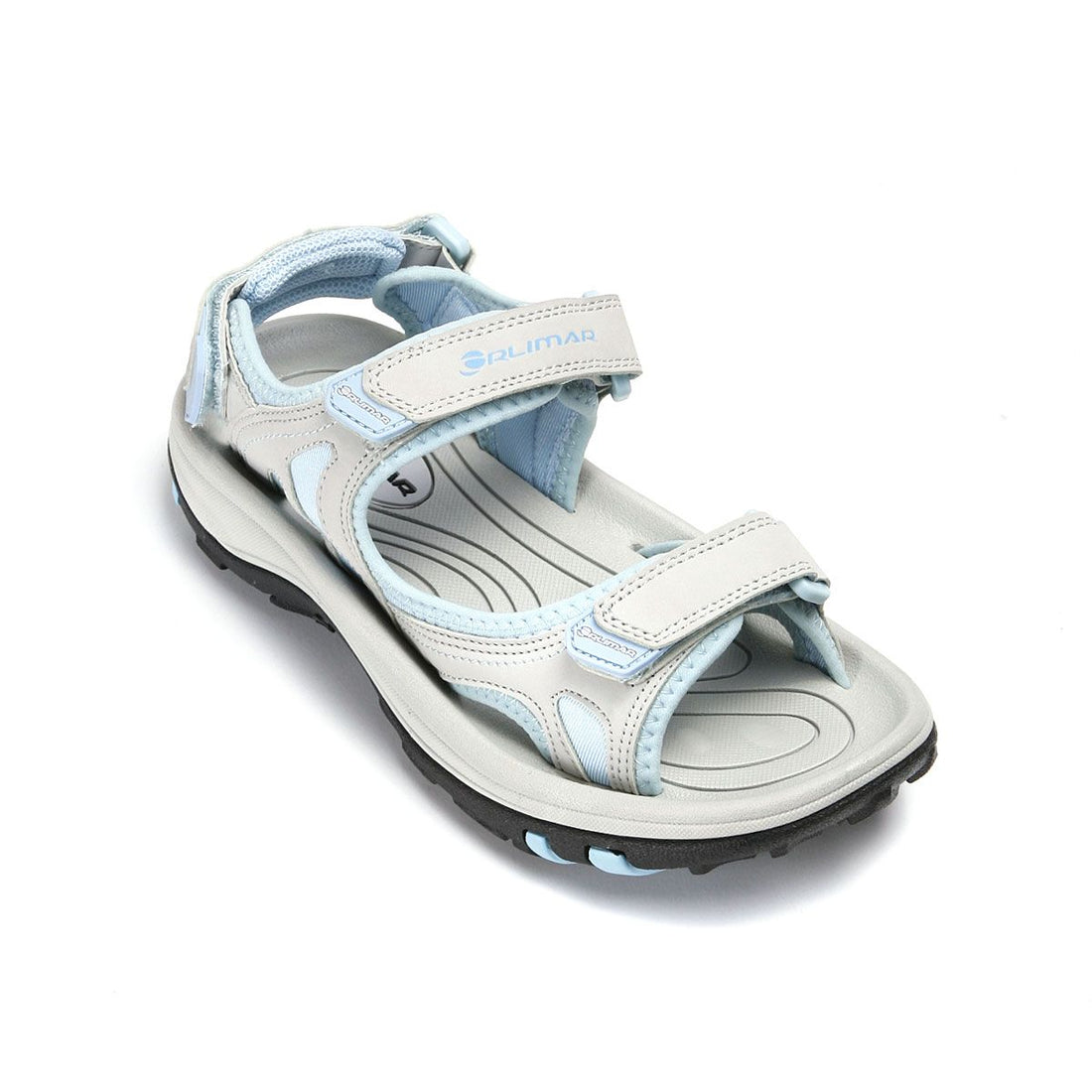 top angled view of a light grey/aqua ladies right Orlimar Golf Sandal with Replaceable Spikes