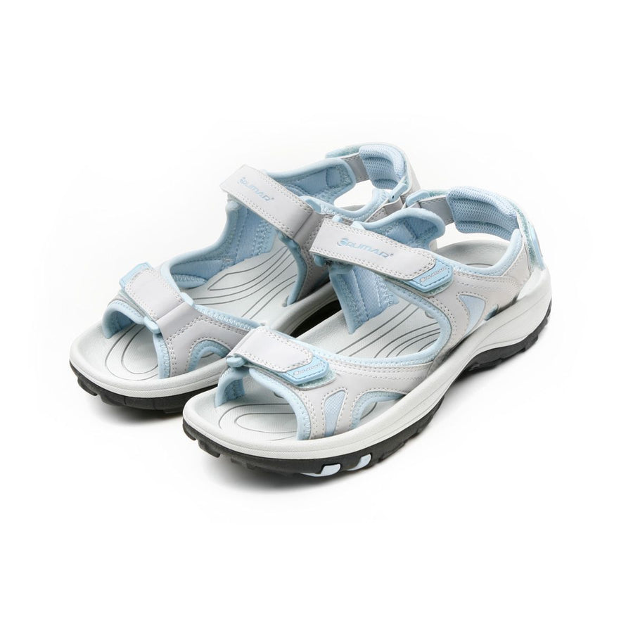 top angled view of a light grey/aqua ladies pair of Orlimar Golf Sandals with Replaceable Spikes