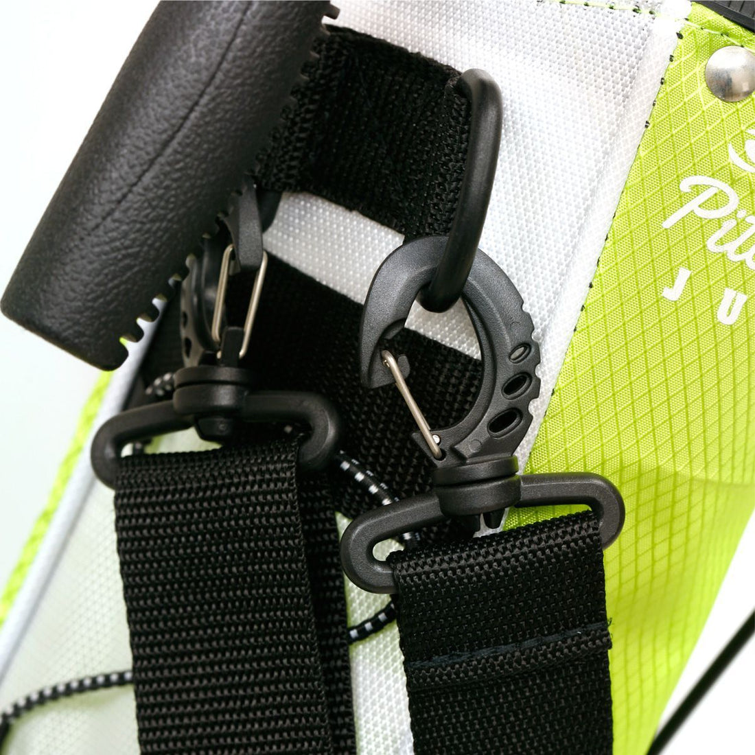 carry handle and shoulder strap clips on a lime green Orlimar Pitch &