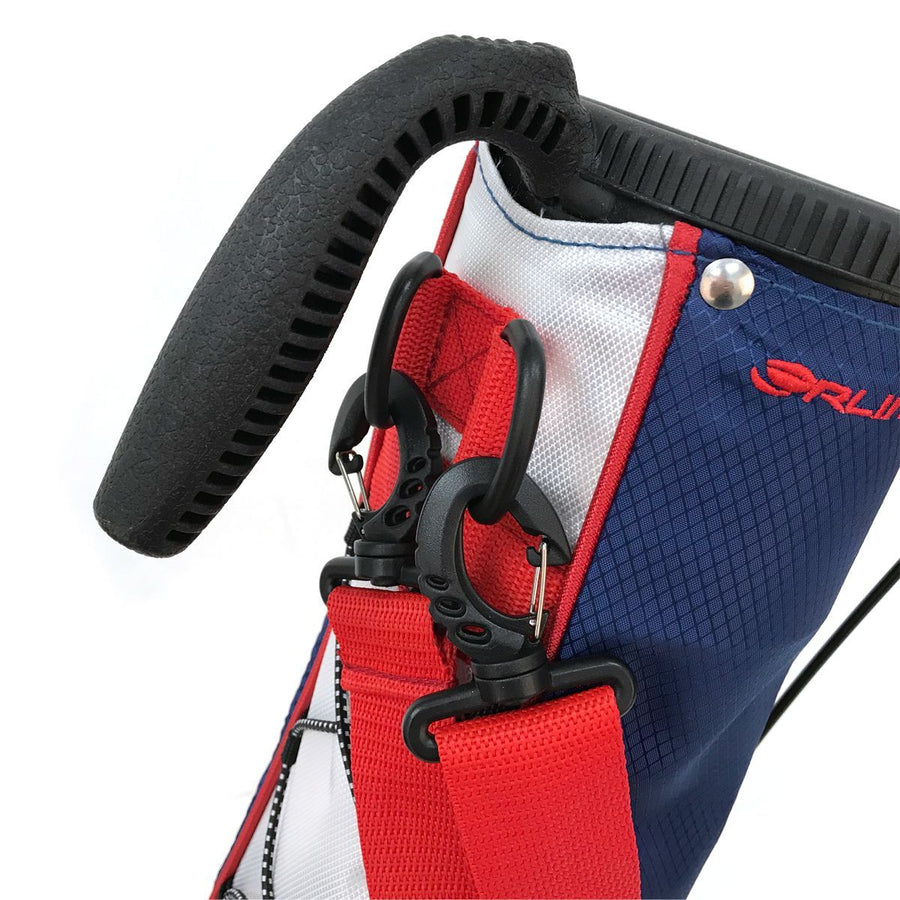 carry handle and shoulder strap clips on a red, white and blue Orlimar Pitch 'N Putt Lightweight Stand Carry Bag