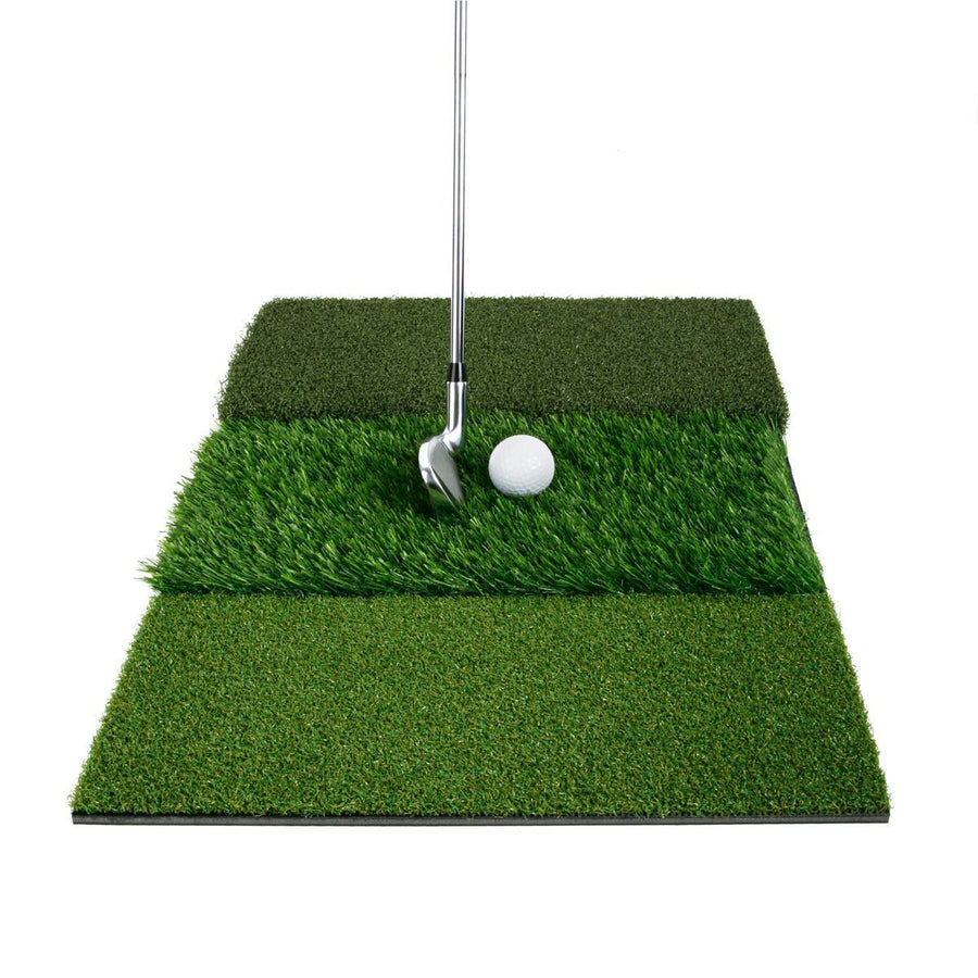 golf iron behind a white golf ball on the simulated rough grass on an Orlimar Triple Surface Golf Hitting Mat